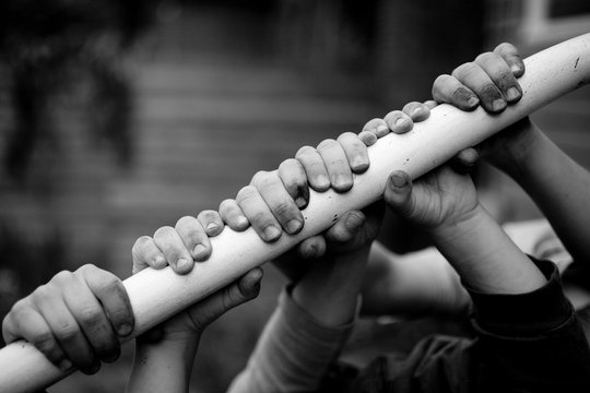 Children  holding on to railing