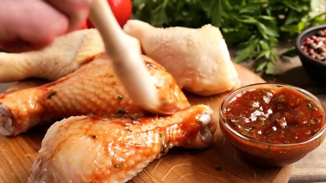 Chicken leg marinated with sauce red put on skin