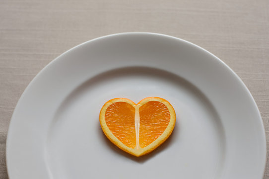 Orange slice in the shape of a heart