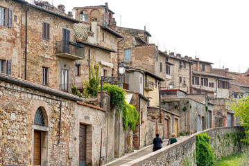 Fototapeta na wymiar Alleys and small stone roads in the Renaissance city of Colle Val d'Elsa in the province of Siena, Tuscany