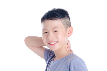 Young asian boy smiling over white background