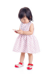 Little asian girl using smart phone isolated over white