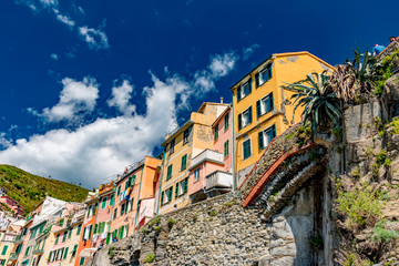 View of the colorful city of Riomaggiore in the gulf of the five lands in Italy
