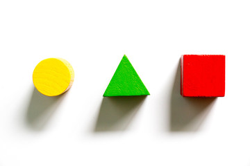 Set of colorful wooden shape toy (Square, triangle, round) on white background