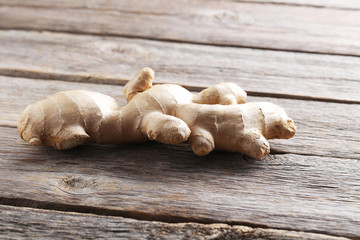Ginger root on grey wooden table