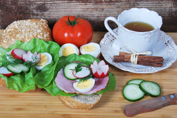 Delicious sandwich with ham and lettuce