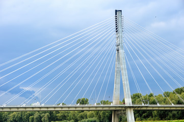 Modern Swietokrzyski bridge in Warsaw over Vistula river, Poland