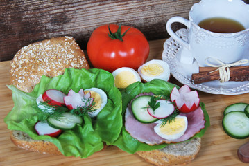 Delicious sandwich with ham and lettuce
