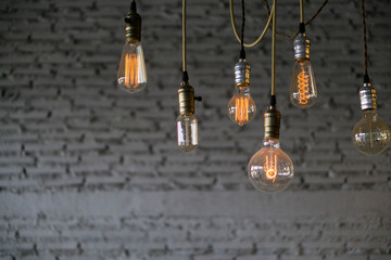 Many bulbs with brick background