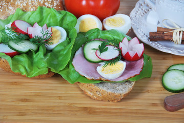 Delicious sandwich with ham and lettuce