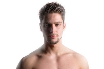 Fototapeta premium Close up portrait of a handsome young shirtless man posing against white background