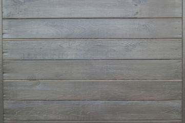Obraz na płótnie Canvas Dark old wooden fence. wood palisade background. planks texture. Black