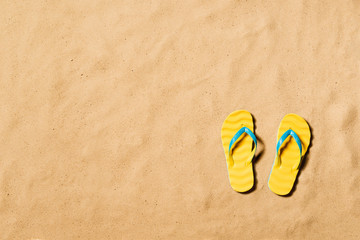 Summer vacation background with a pair of flip flop sandals.