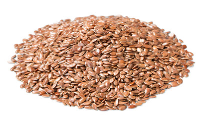 raw flaxseeds on white, (large depth of field, taken with tilt shift lens)
