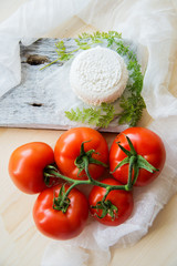 White cheese on wooden board,clipping path.