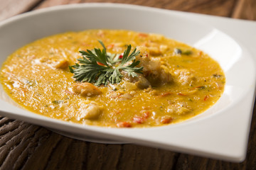shrimp bobo - a Brazilian dish of shrimp in a pure of manioc meal and coconut milk. Bobo de camarao.