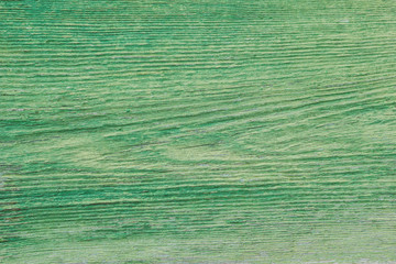 The background picture of the old green wooden Board. Texture.