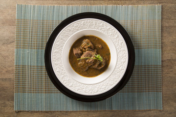 Rustic Stew meat with sauce in the white plate