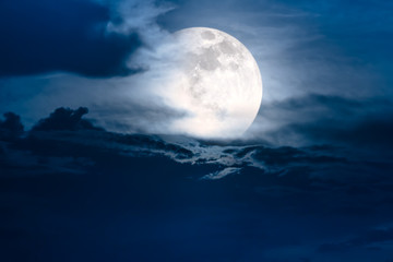 Naklejka na ściany i meble Nighttime sky with clouds and bright super moon with shiny.
