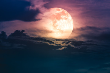 Obraz na płótnie Canvas Nighttime sky with clouds and bright super moon with shiny.