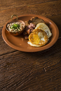 Traditional Brazilian lunch dish called virado a paulista