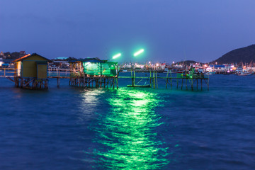 Sypsea house on the sea with green light