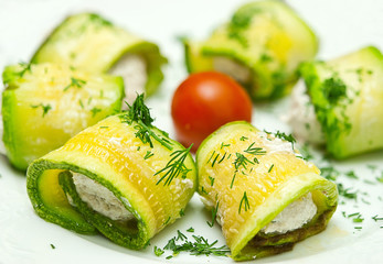Fresh salad of courgettes on a white background