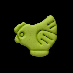 Dog biscuit on black background