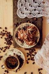 Breakfast with cup of coffee and chocolate cake