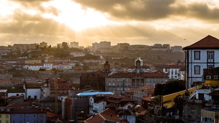Fototapeta premium Golden rays of Light over the City Porto, Portugal