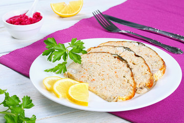 delicious stuffed carp on white plate