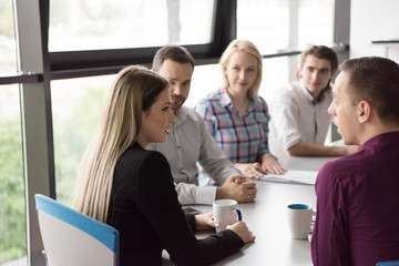 Group of young people meeting in startup office