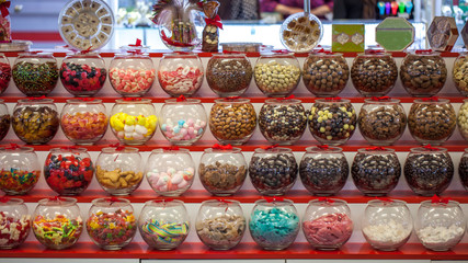 Filled glass candy jars at the fair