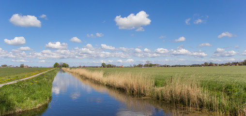 Fototapeta na wymiar Panorama of a river in the dutch landscape