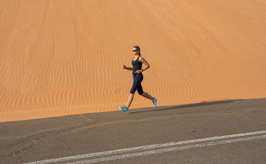 Woman exercising in the desert.