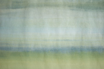 Close-up photo of a hand painted, light blue and green abstract painting. Simple image of an empty,...
