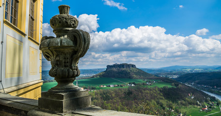 Fototapeta na wymiar Decorative vase in fortress of Koenigstein in front of Elba river and saxon mountains