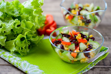Vegetable green salad with sweet pepper, cucumbers and haricot