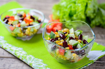Vegetable salad with sweet pepper, cucumbers and haricot