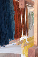 Yarn, loom and cactus