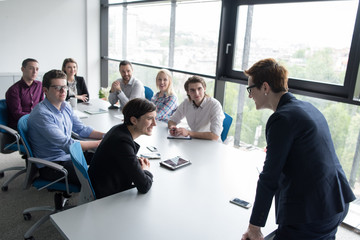 Group of young people meeting in startup office