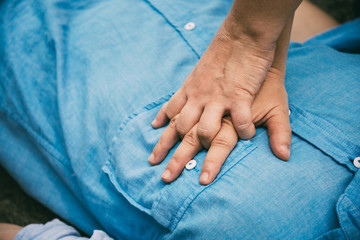 Emergency CPR on a Man who has Heart Attack , One Part of the Process Resuscitation (First Aid)