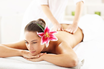 Fototapeta na wymiar Beautiful woman getting massage in spa