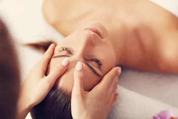 Foto op Canvas Beautiful woman getting massage in spa © Kalim