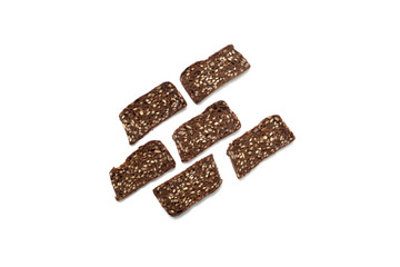 Black bread with seeds on white background
