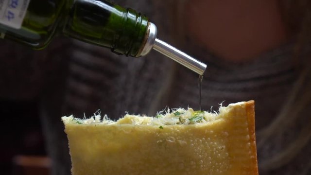 Eating the Traditional Codfish Pastries - Pastel de Bacalhau - in Municipal Market - Mercadao - in Sao Paulo, Brazil