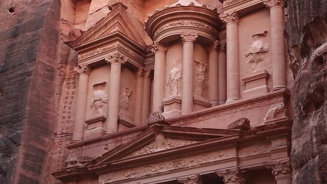 Al Khazneh or Treasury - Nabatean rock-cut temple of Hellenistic period of ancient Petra, originally known to Nabataeans as Raqmu - historical and archaeological city in Hashemite Kingdom of Jordan