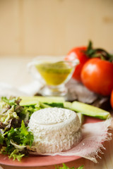 Plate of Healthy Classic Caprese Salad with Mozzarella Cheese, Tomatoes and Basil