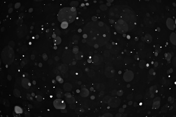 snow on a black background texture overlay bokeh highlights