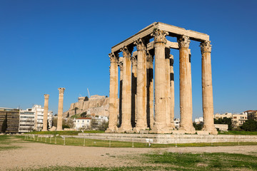 Fototapeta premium Temple of Olympian Zeus and Acropolis Hill, Athens, Greece.
